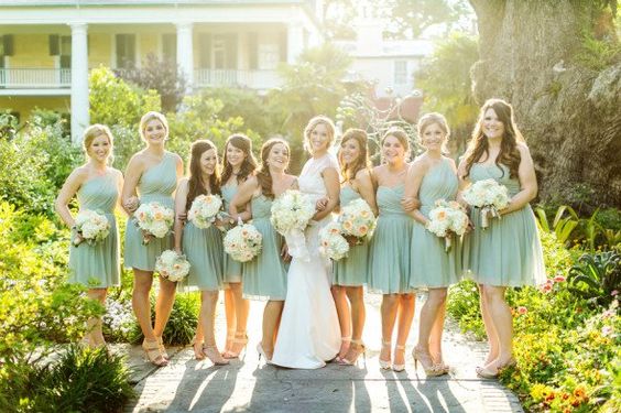 light green bridesmaid dresses and white bridal gown for june wedding colors combos for 2025 light green and cream