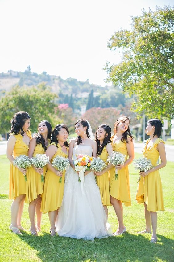 yellow bridesmaid dresses and white bridal gown for june wedding colors combos for 2025 yellow pink and orange