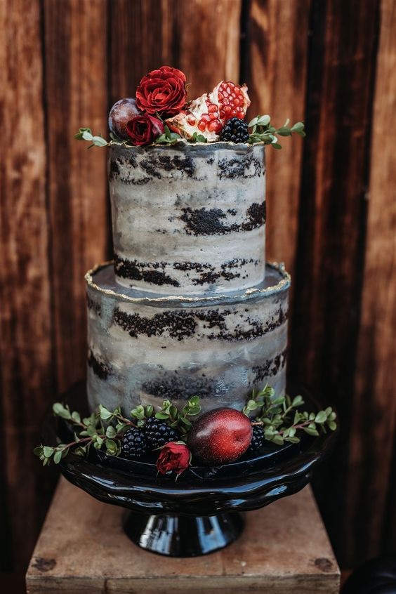 black rustic wedding cake dotted with burgundy flowers for burgundy wedding colors for 2025 burgundy and black