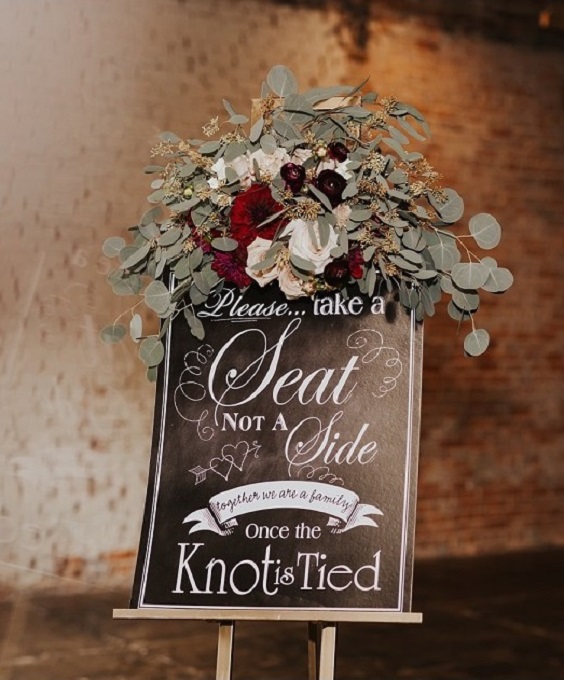 wedding sign decorated with burgundy flower and sage shade greenery for burgundy wedding colors for 2025 burgundy and sage green