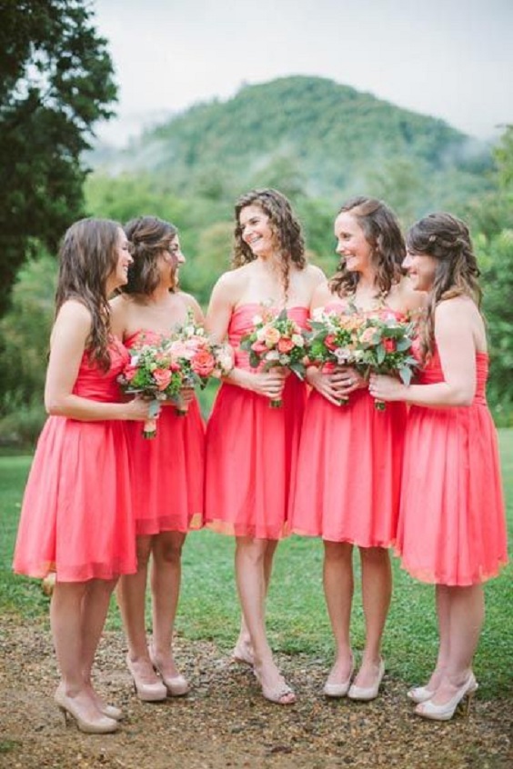 coral bridesmaid dresses with coral and peach bouquets for may wedding colors combos for 2025 coral and peach