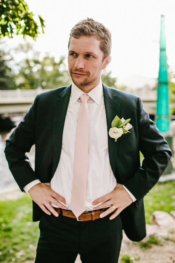 dark green grooms attire and a pink tie for may wedding colors combos for 2025 dark green and pink