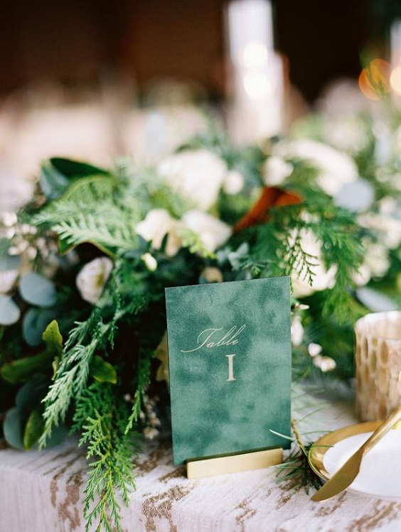 dark green table number and dark green centerpiece for may wedding colors combos for 2025 dark green and pink