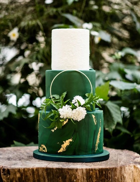 dark green wedding cake with white flowers for april wedding colors combos for 2025 dark green and white