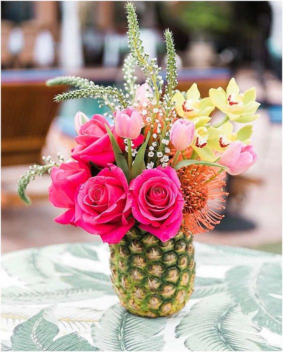 one pineapple with hot pink yellow and dusty rose flowers for april wedding colors combos for 2025 hot pink and dusty ros