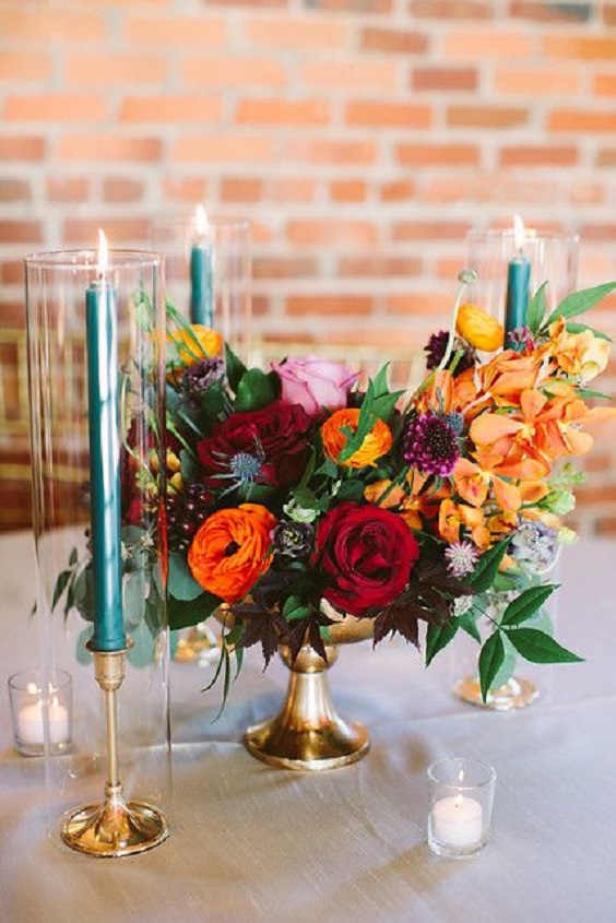 teal candles and red orange pink flowers for april wedding colors combos for 2025 teal red and pink