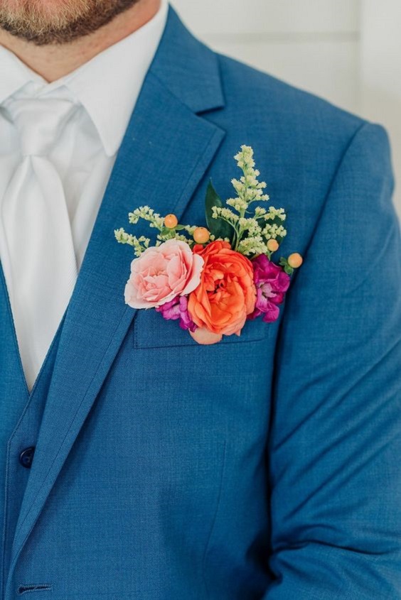 teal grooms attire with pink orange and hot pink flowers for april wedding colors combos for 2025 teal red and pink