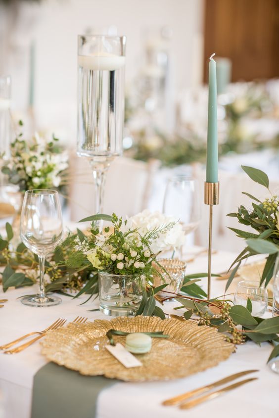 sage green candles and table linen for april wedding colors combos for 2025 sage green and pink