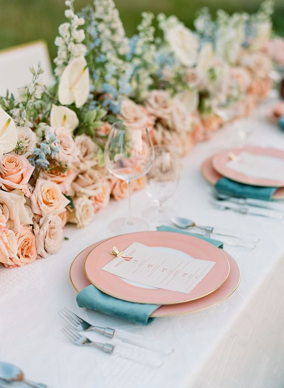 peach flower and greenery centerpieces teal napkins peach plates for teal wedding colors for 2025 teal peach and greenery