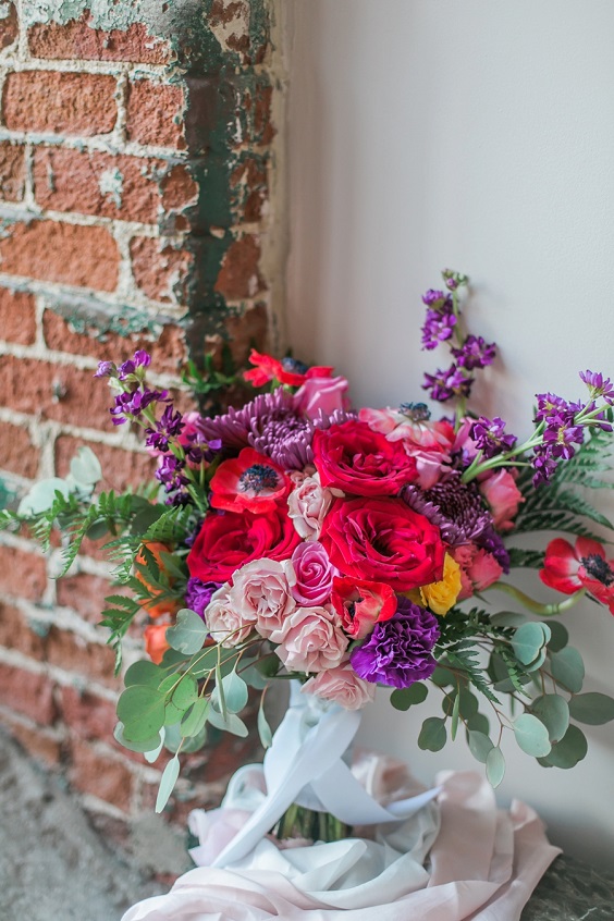 purple red yellow pink flowers and greenery bridal bouquet for teal wedding colors for 2025 teal and rich colors