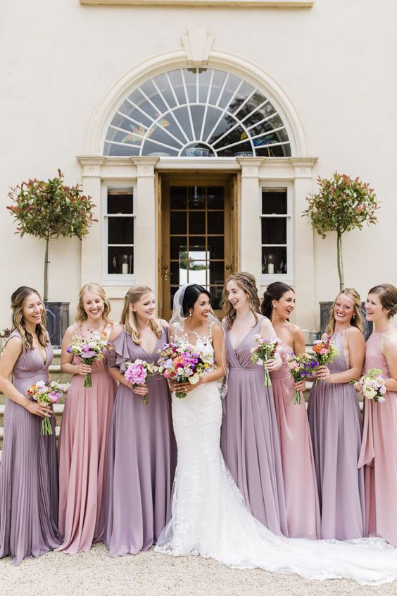 valerian and pink bridesmaid dresses and a white wedding gown for purple wedding colors combos for 2025 valerian and pink