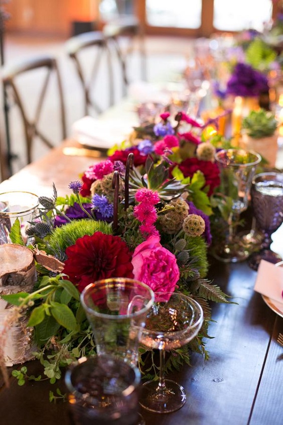 purple and red centerpiece at wedding table for purple wedding colors combos for 2025 purple and red