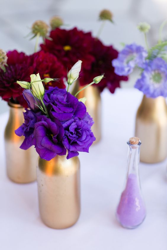 purple and red flowers at wedding table for purple wedding colors combos for 2025 purple and red