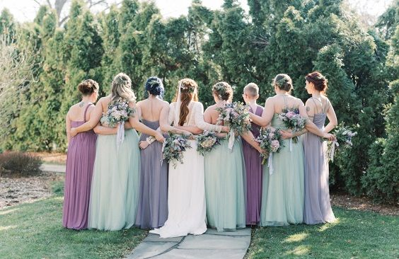 lavender grey and sage green bridesmaid dresses and a white wedding gown  for purple wedding colors combos for 2025 lavender and sage green