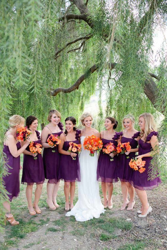 purple bridesmaid dresses and a white wedding gown for purple wedding colors combos for 2025 purple and orange