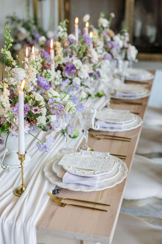 light purple flowers at wedding table for july wedding colors combos for 2025 light purple and pink