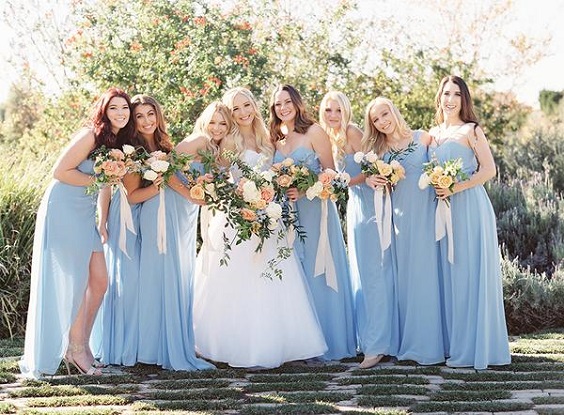 sky blue bridesmaid dresses and a white wedding gown for summer wedding colors combos for 2025 sky blue and apricot