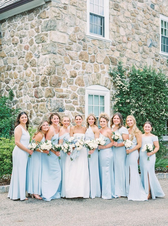 ice blue bridesmaid dresses white bridal gown for spring wedding color schemes 2025 ice blue white and greenery