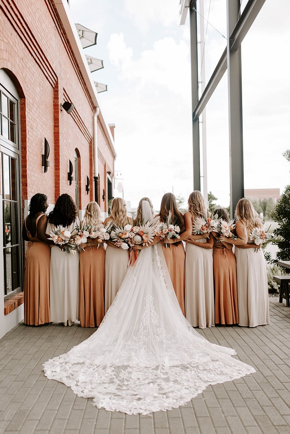 mismatched peach and neutral bridesmaid dresses for boho wedding color ideas 2025 peach and neutral