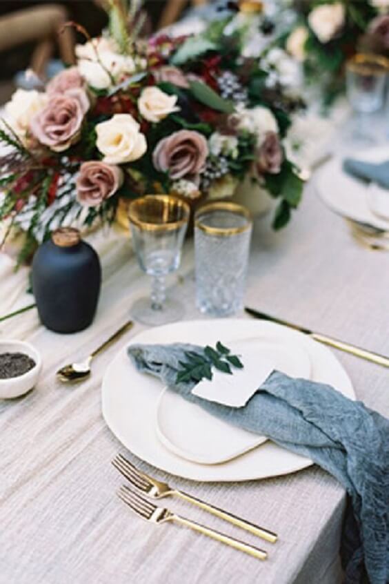 Table decorations for dusty rose and dusty blue wedding