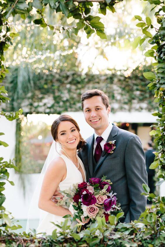 White Bride and grey groom for Dusty Rose and Burgundy wedding