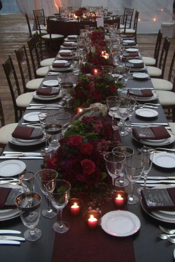 grey tablecloth and burgundy centerpiece for fall grey and burgundy wedding