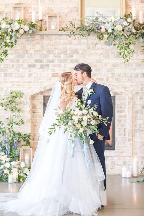 White Bride and Navy groom for dusty blue March wedding