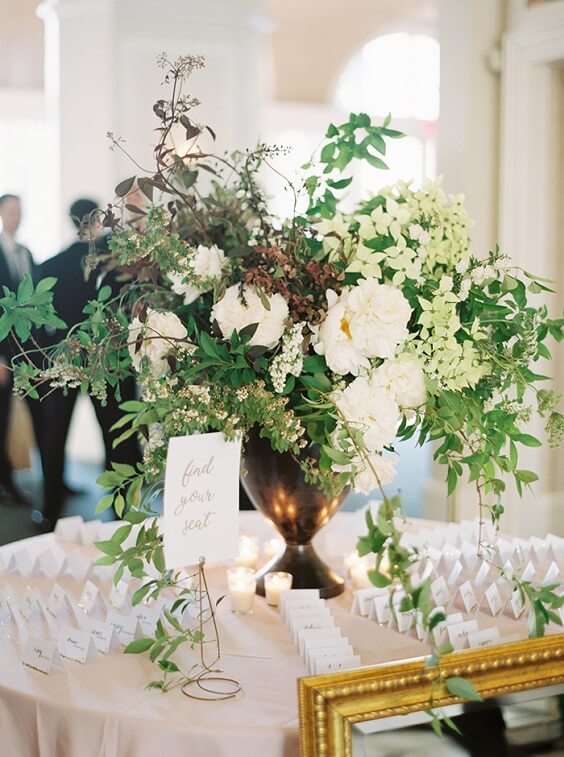 green and white flower centerpiece for spring dusty rose wedding