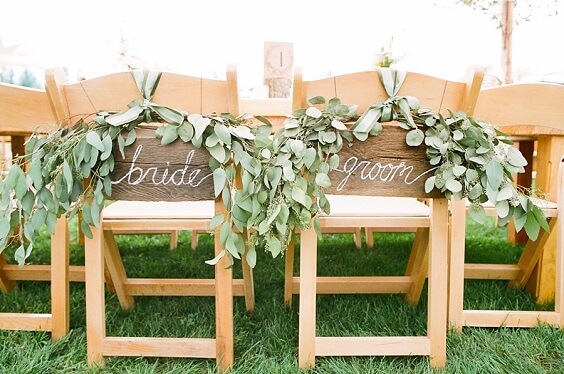 bride and groom's chairs for summer sage green and white wedding