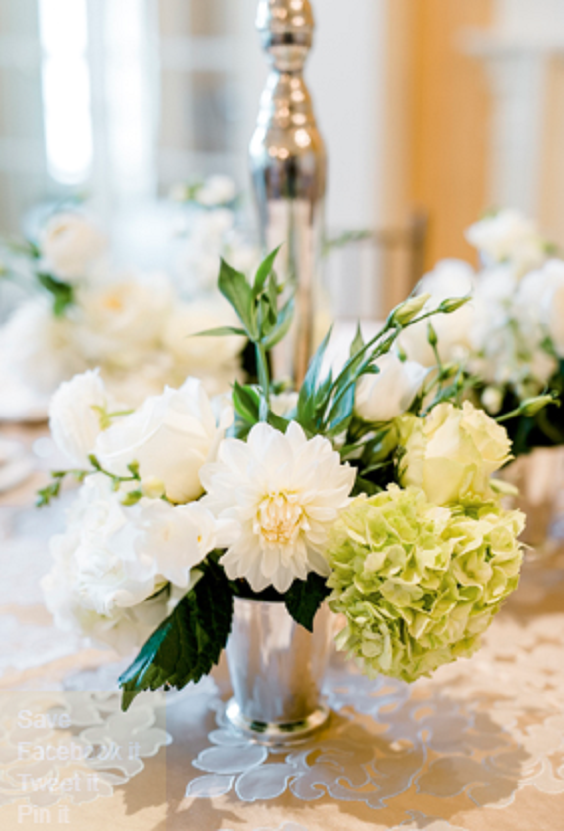 white and green floral centerpiece for fall dark green wedding