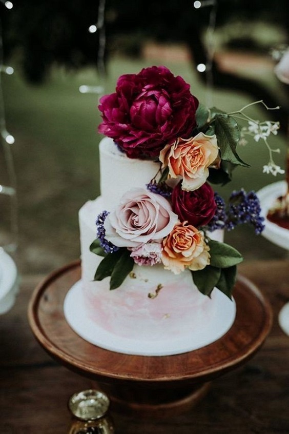 white wedding cake with burgundy flowers for fall burgundy wedding