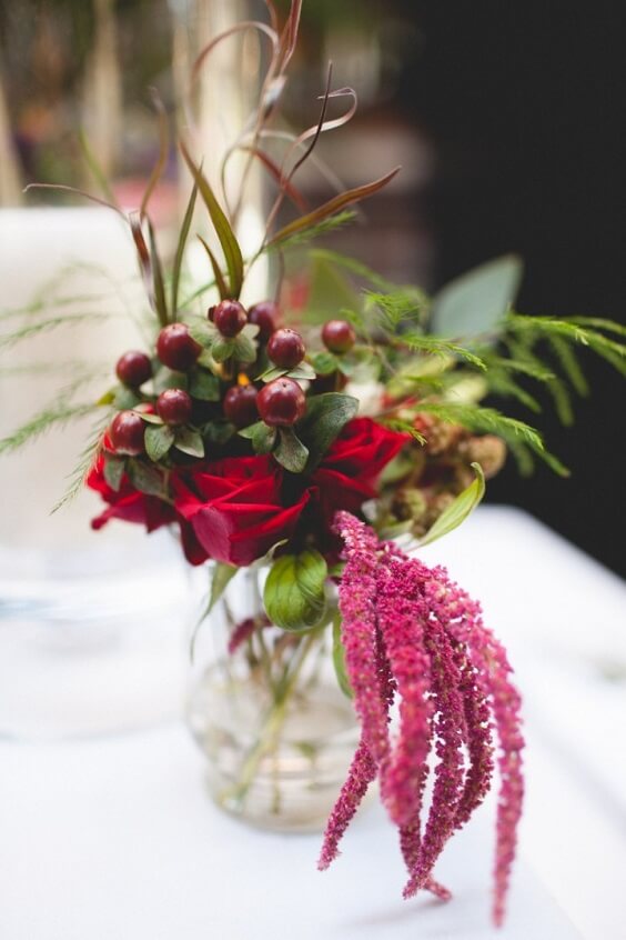 bottle and burgundy flowers for fall burgundy wedding