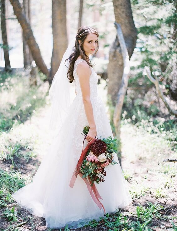 bride for fall burgundy wedding