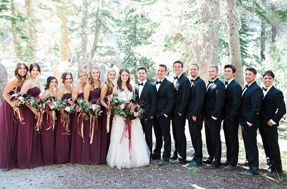 bridesmaids and groomsmen for fall burgundy wedding