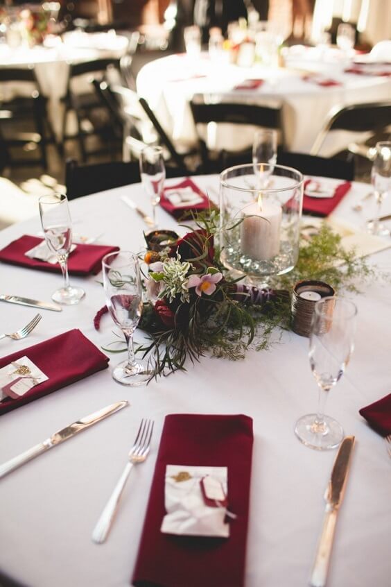 table setting for fall burgundy wedding