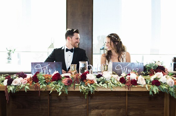 wedding reception table for fall burgundy wedding