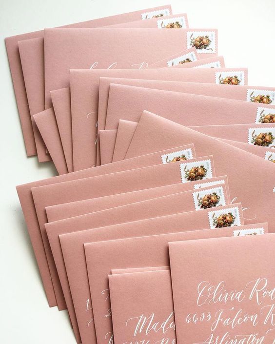 dusty rose envelopes with white calligraphy for fall dusty rose wedding