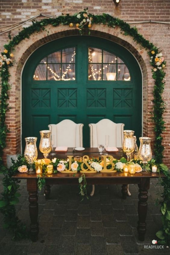 gold place setting for winter green wedding