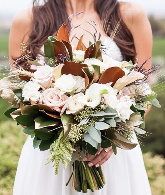 bride with bouquet for champagne and burgundy wedding bridesmaid dresses bouquets and cakes