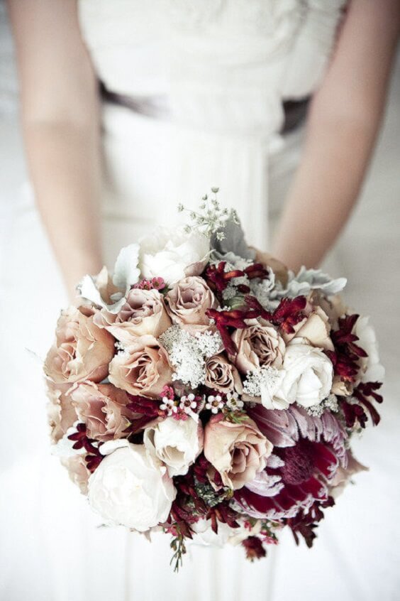 bride with bouquet for champagne and burgundy wedding bridesmaid dresses bouquets and cakes 2