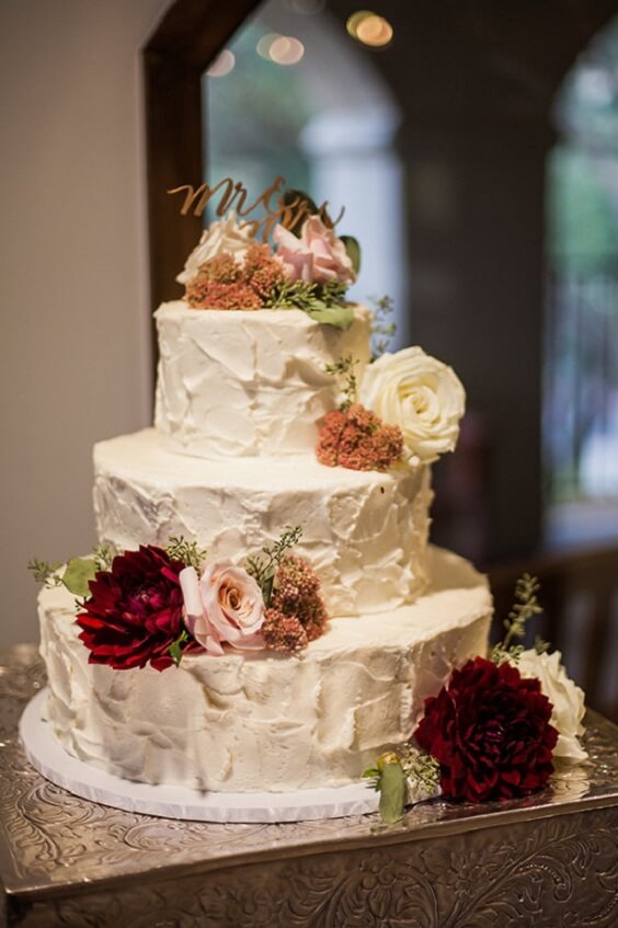 wedding cake for champagne and burgundy wedding bridesmaid dresses bouquets and cakes